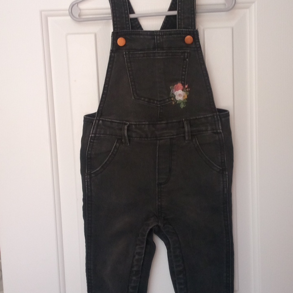 Black overalls with floral detail